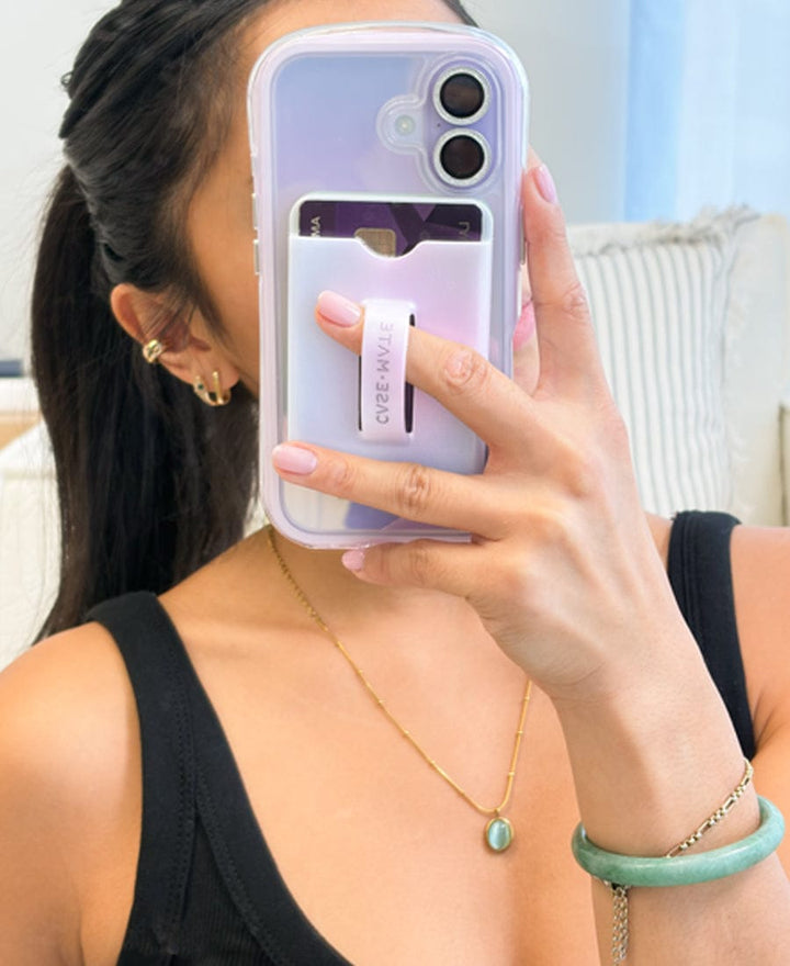 Girl taking mirror selfie with MagSafe Loop Wallet on her iPhone