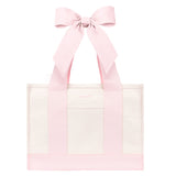 A light pink and white tote bag with wide pink shoulder straps and a large matching pink bow at the top, shown on a plain white background.
#color_ballet pink bow