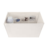 A white fabric organizer box with multiple interior pockets holding small items like a blue-and-white bottle, glasses, and a smartphone case, shown on a plain white background.
#color_french vanilla