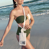 Woman in green bikini with phone case on beach #color_ivory pearl bow