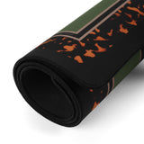 A rolled-up black yoga mat featuring a bold pattern of orange flames and olive green stripes, shown on a clean white background.
#color_classic tortoiseshell