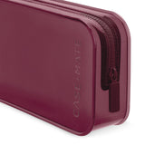 A close-up of a translucent burgundy zippered case with the brand name 'CASE-MATE' debossed vertically on the side and a matching zipper pull tab.
#color_mulberry