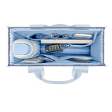 A light blue organizer pouch shown from above, filled with various personal accessories including a white and blue hair dryer, a car key fob, a notebook, and a small brush, on a solid white background.
#color_carolina blue