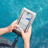 Person holding a phone with a clear protective case by a pool
#color_silver chrome