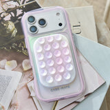 Phone case with bubble design on a decorative surface
#color_iridescent