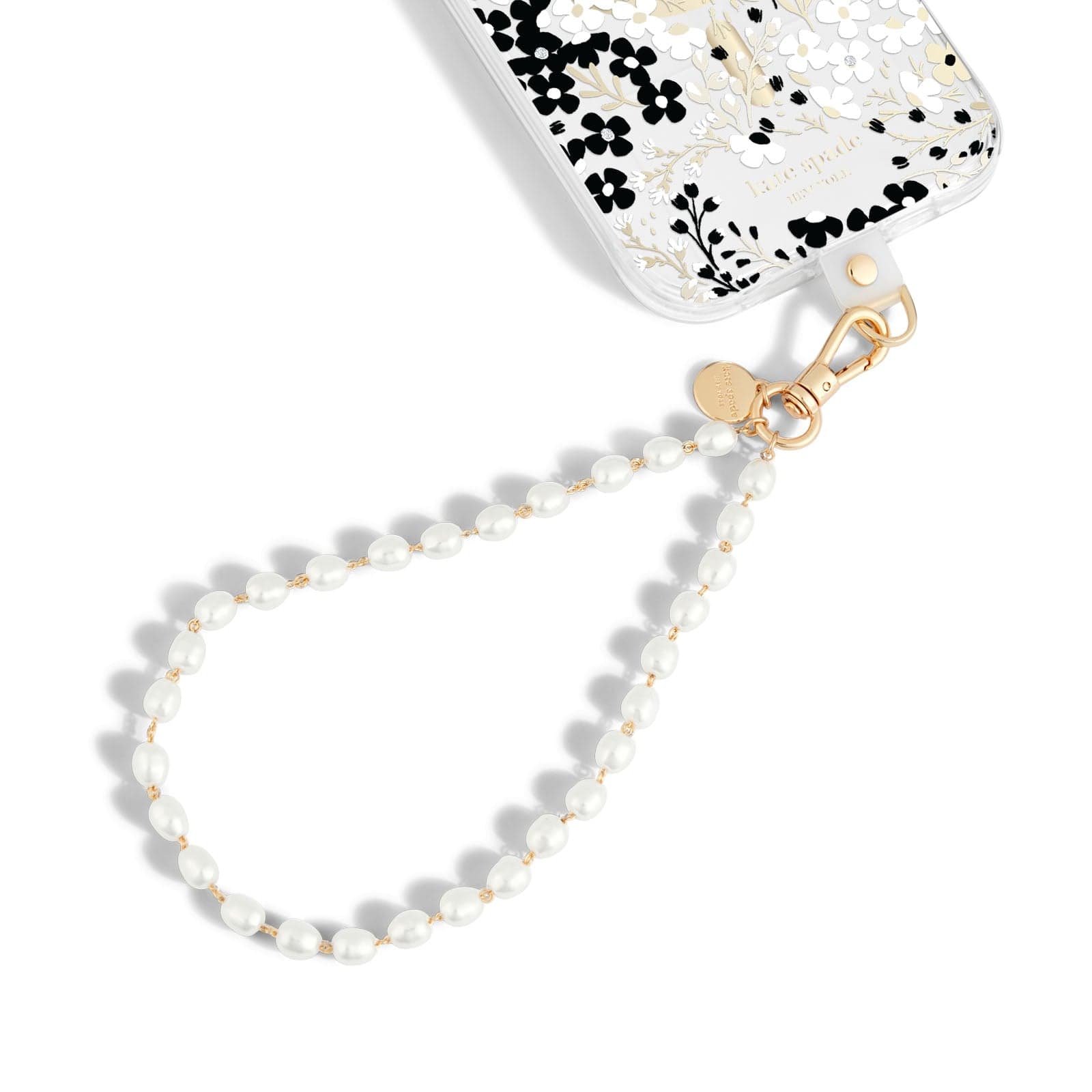 Clear phone case with black and white floral pattern attached to pearl beaded wrist strap with gold-tone hardware.