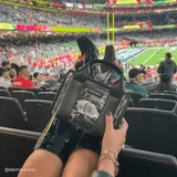 Woman holding clear stadium bag in the stadium seats
#color_midnight_black