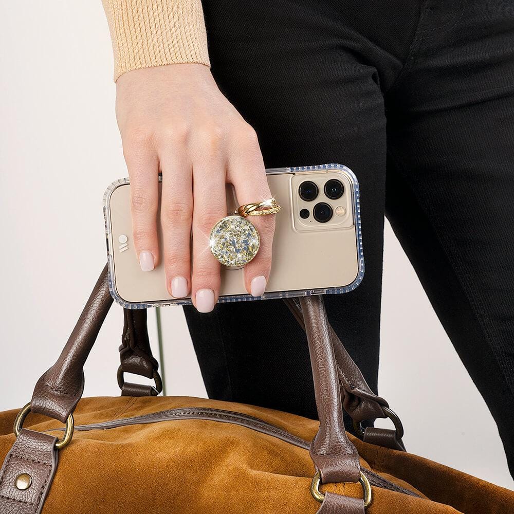 Hand holding bag and phone with mini. color::Twinkle Gold