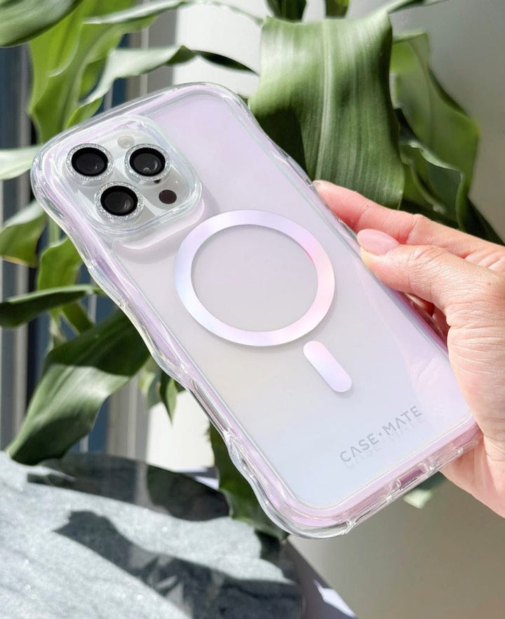 Hand holding a iPhone with Jelly Pop phone case with a plant in the background