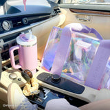 Soap Bubble Jelly Tote in passenger seat of car with stanley cup in the cup holder.
#color_iridescent