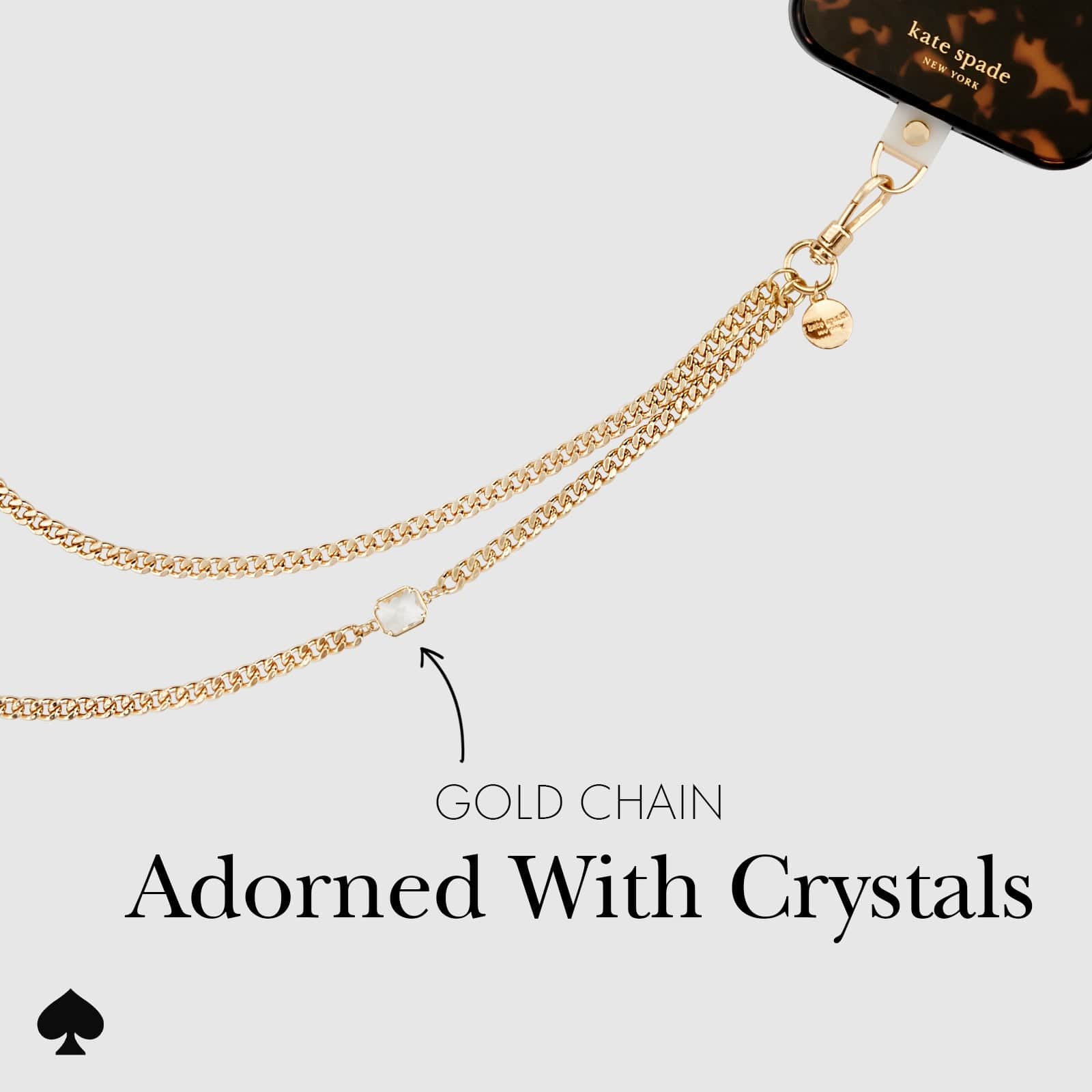 GOLD CHAIN ADORNED WITH CRYSTALS