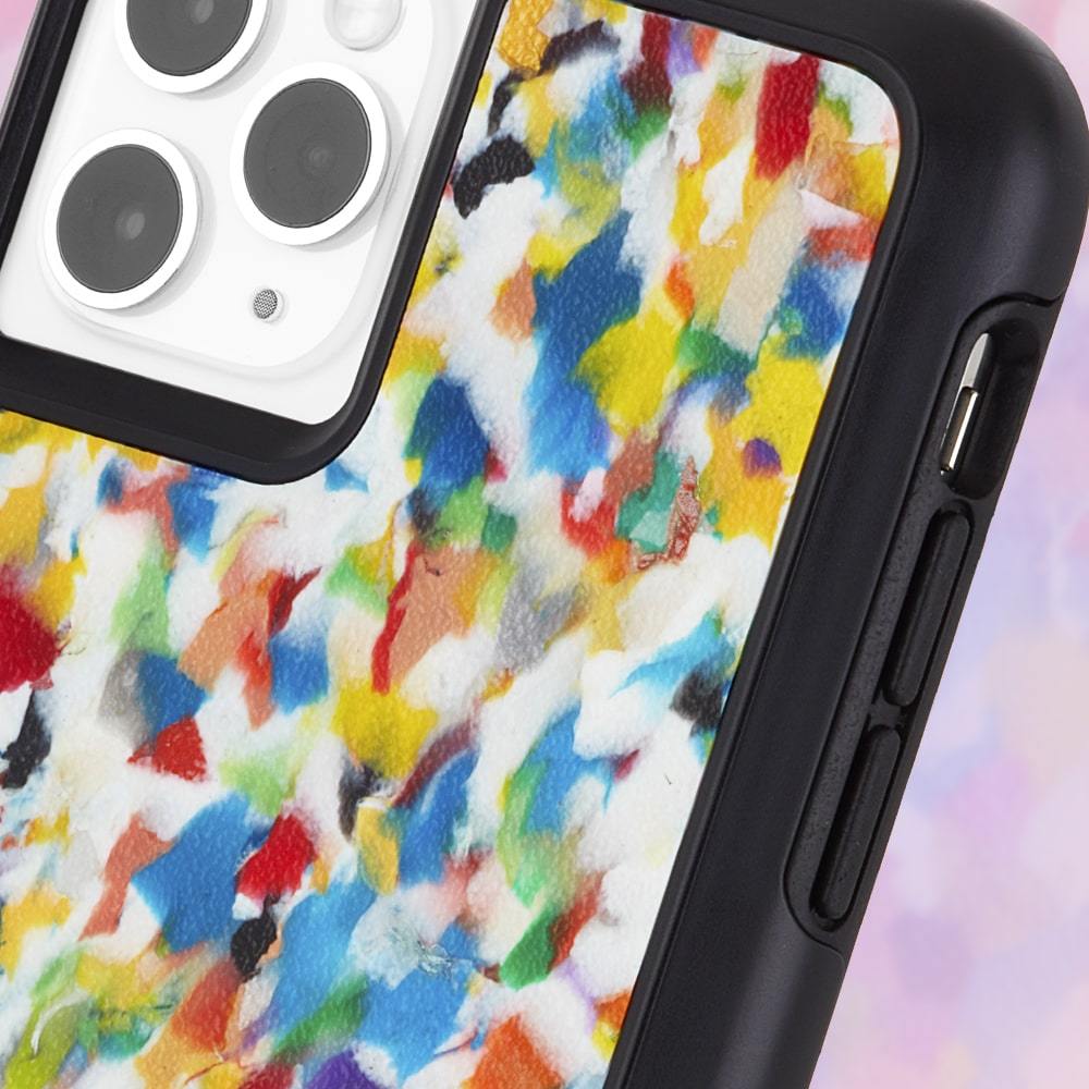 Up close of rainbow colored recycled iPhone 11 Pro Max case. color::Rainbow Confetti