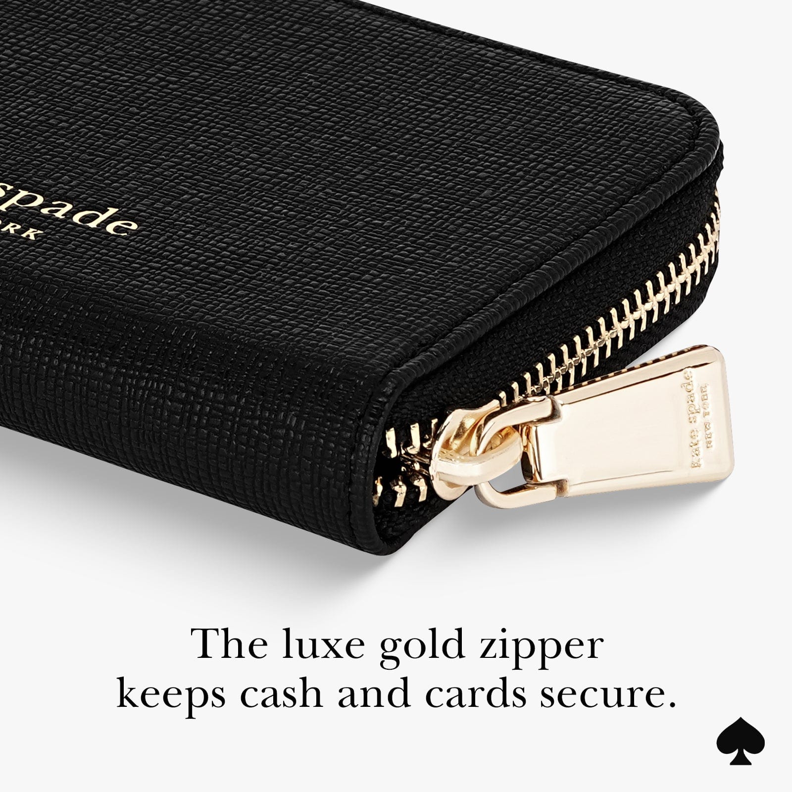 The luxe gold zipper keeps cash and cards secure