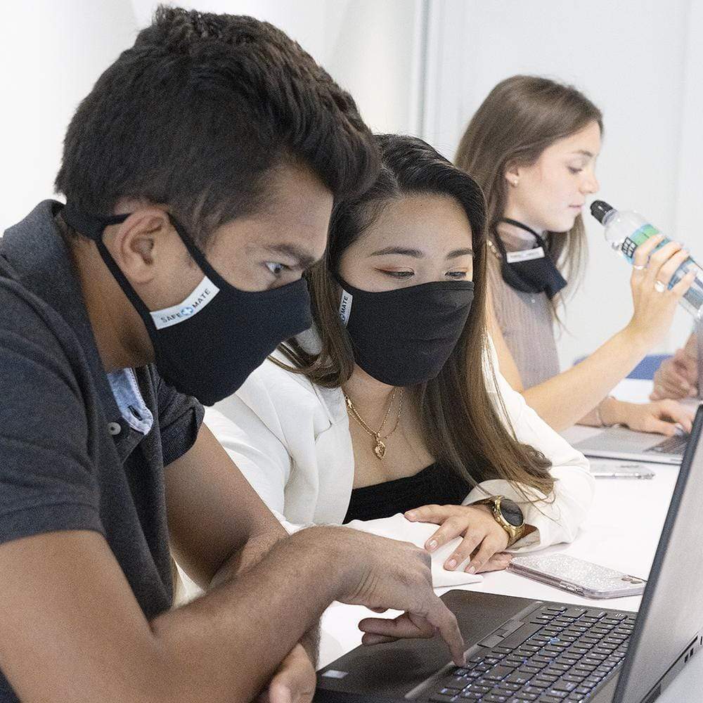 Coworkers i office wearing protective cloth face masks. color::Black
