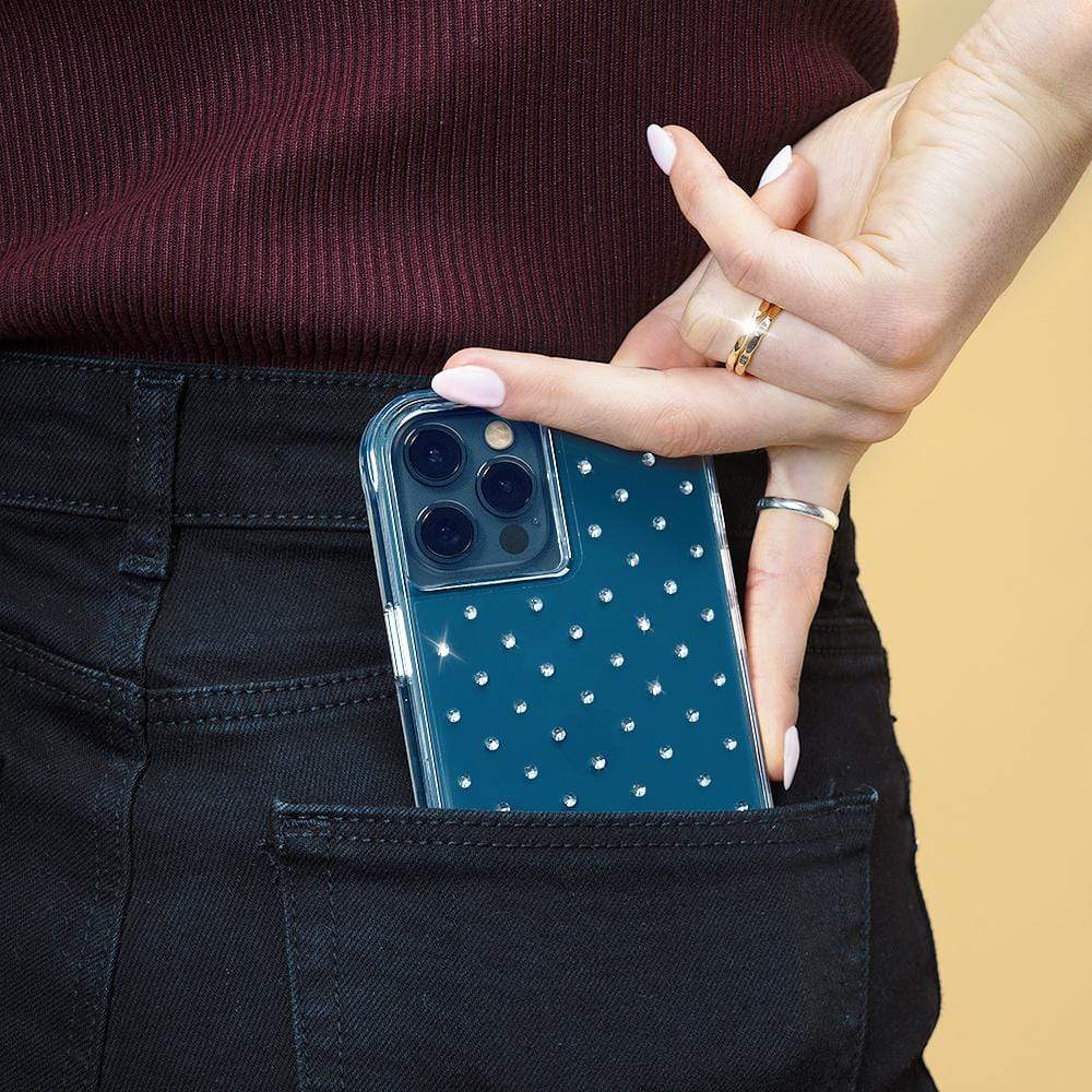 Hand pulling sparkly fashion case out of back pocket. color::Sheer Gems