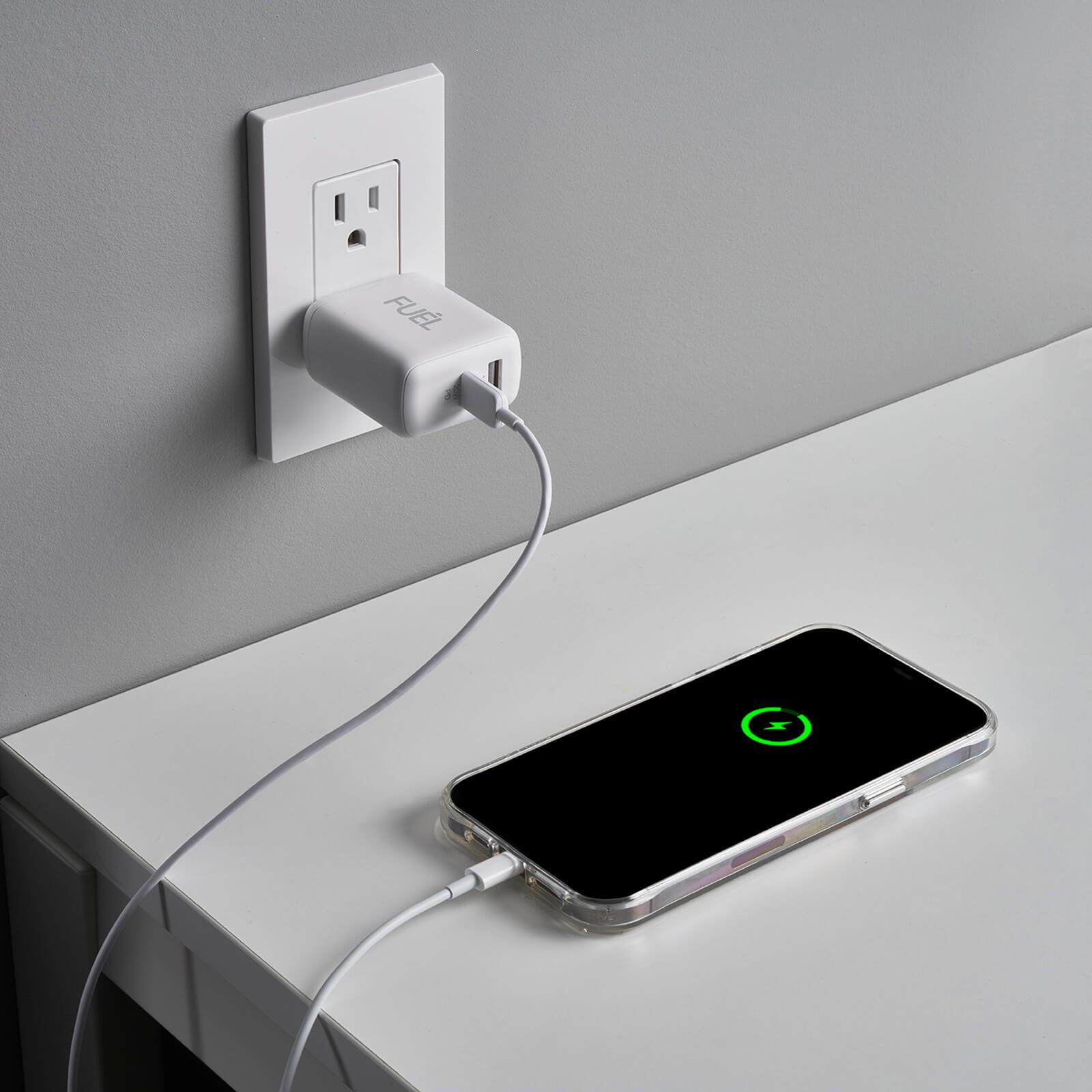 Fuel 32W charger plugged into wall charging iPhone 12 series. color::White