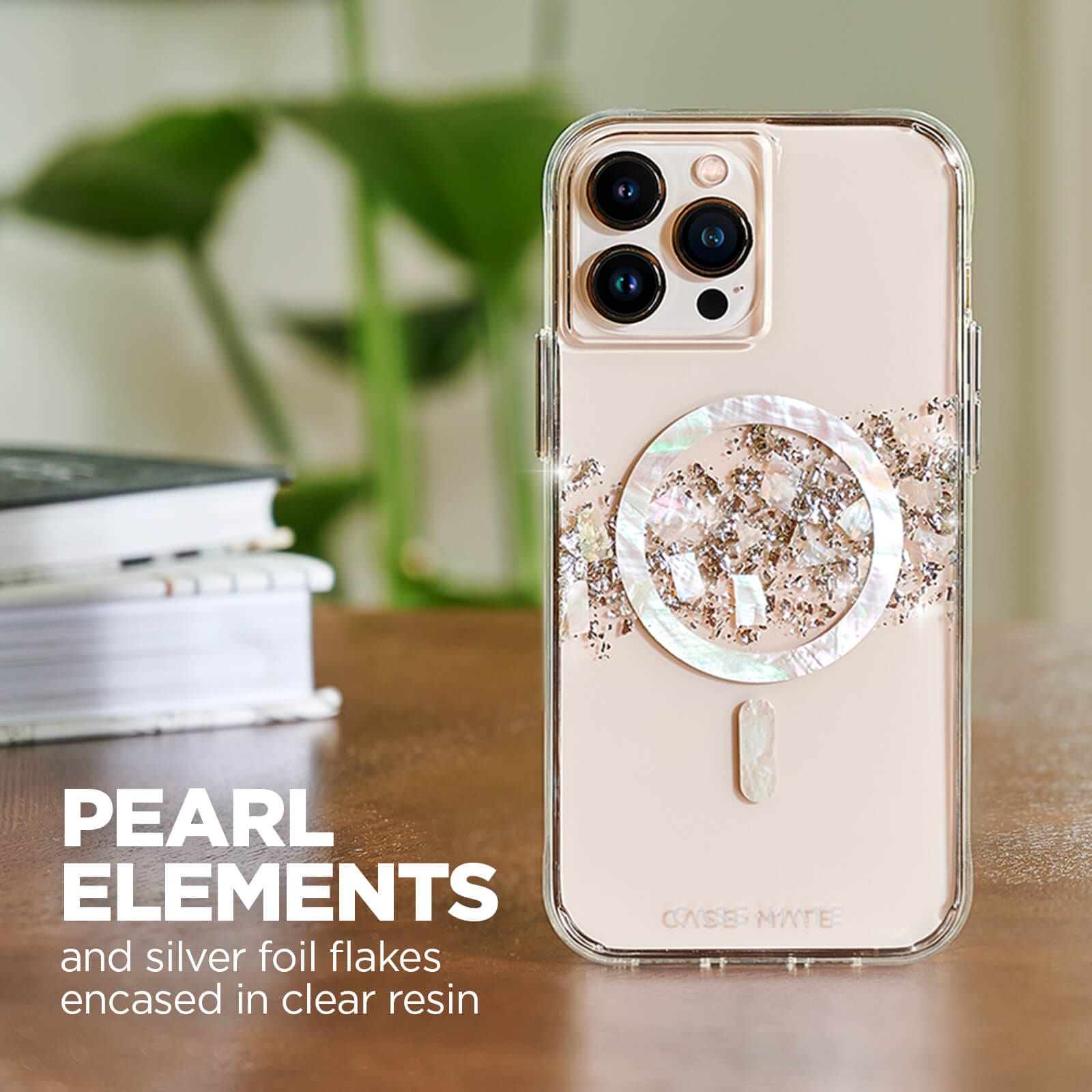 Pearl elements and silver foil flakes encased in clear resin. color::Pearl