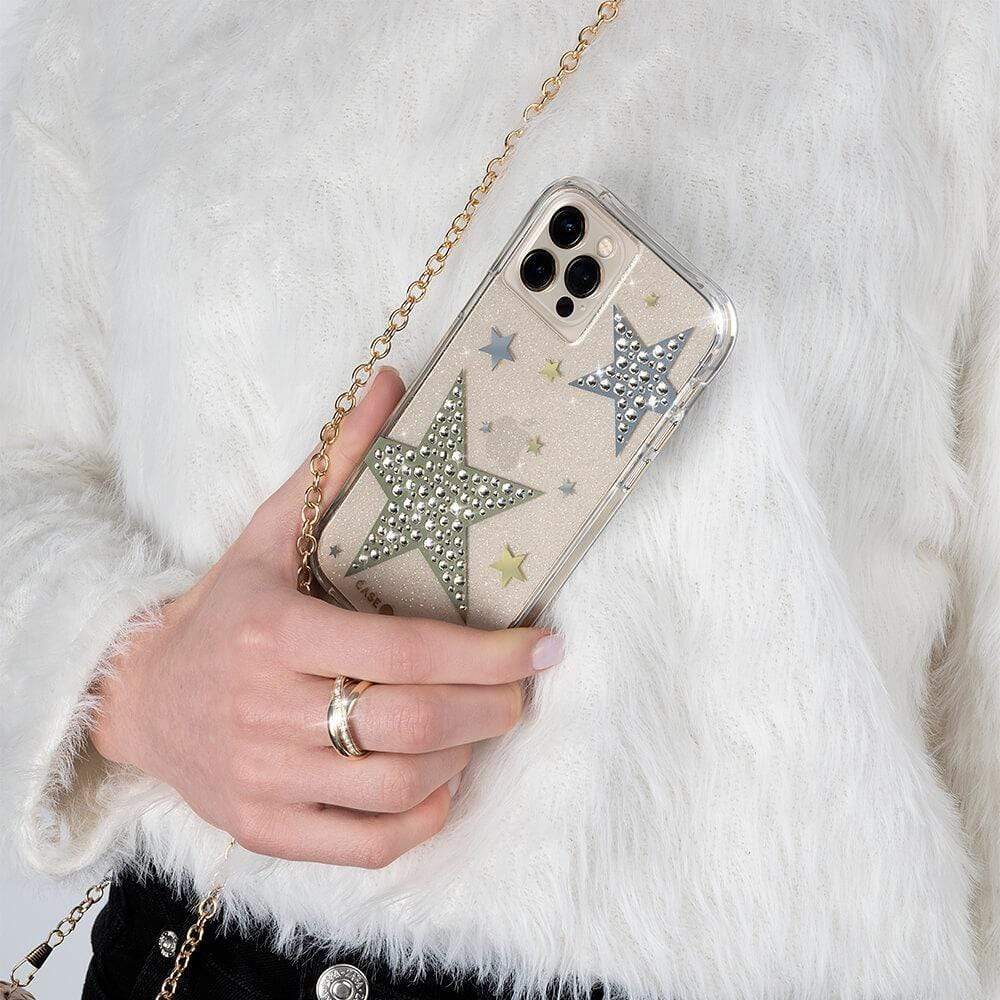 Hand holding Sheer superstar case. color::Sheer Superstar