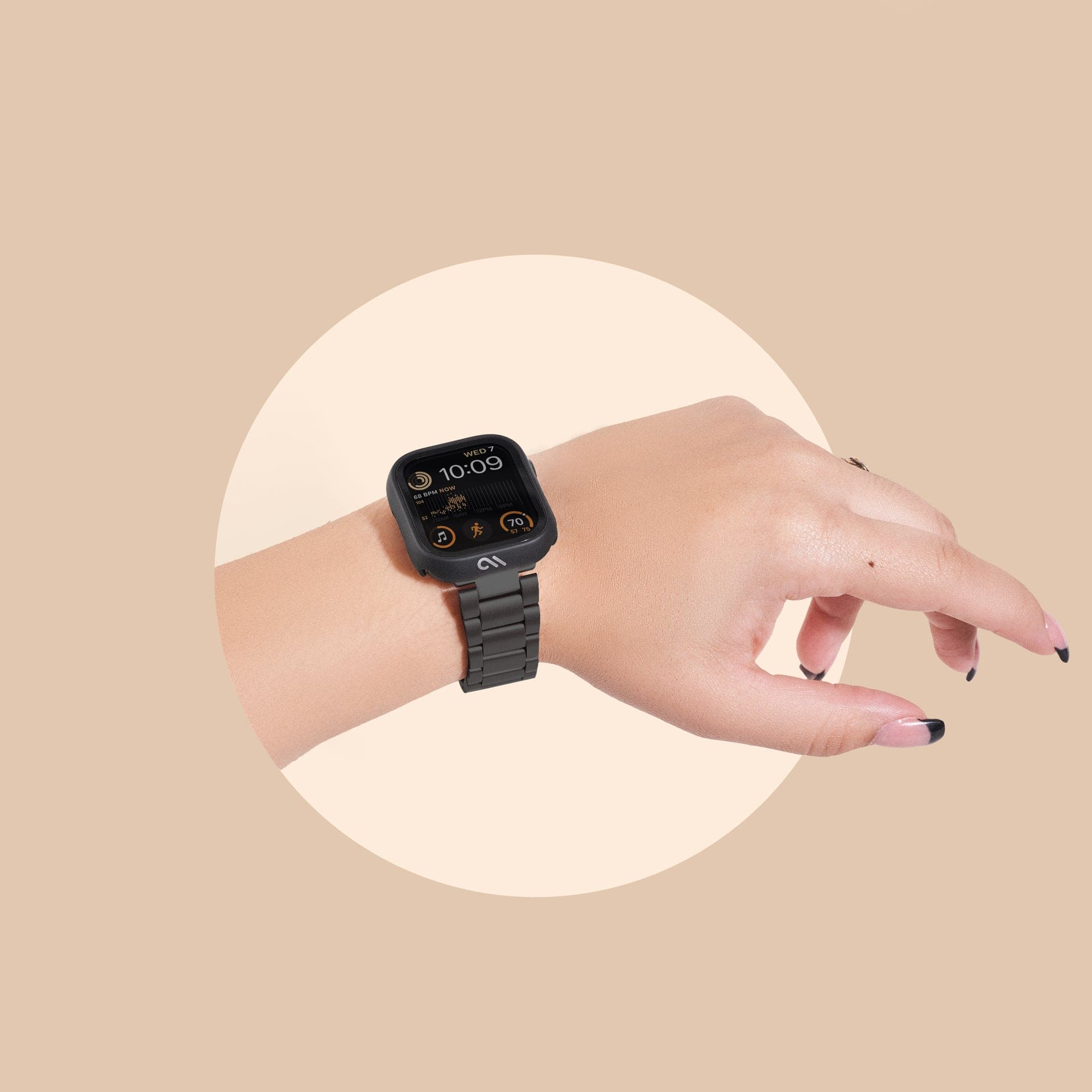 Hand with Apple Watch on wrist with Tough Black Case.