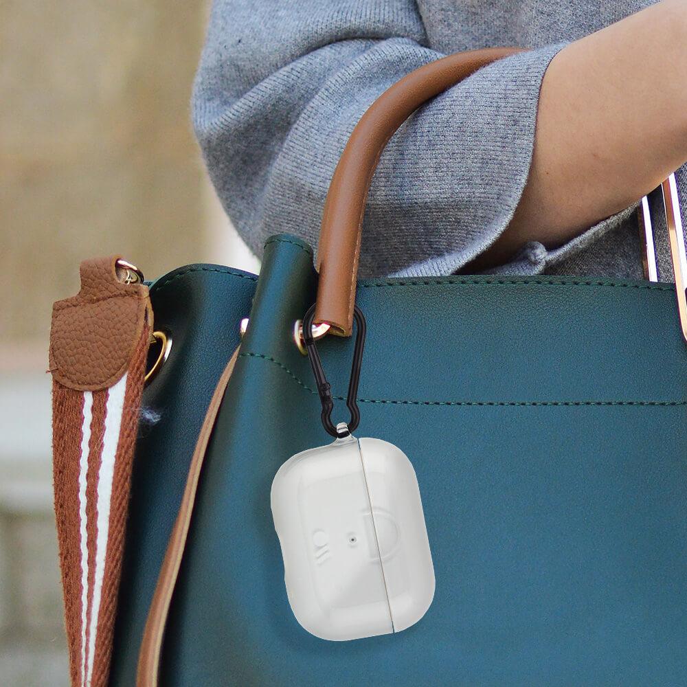 Tough Clear AirPods case hooked to purse. color::Clear