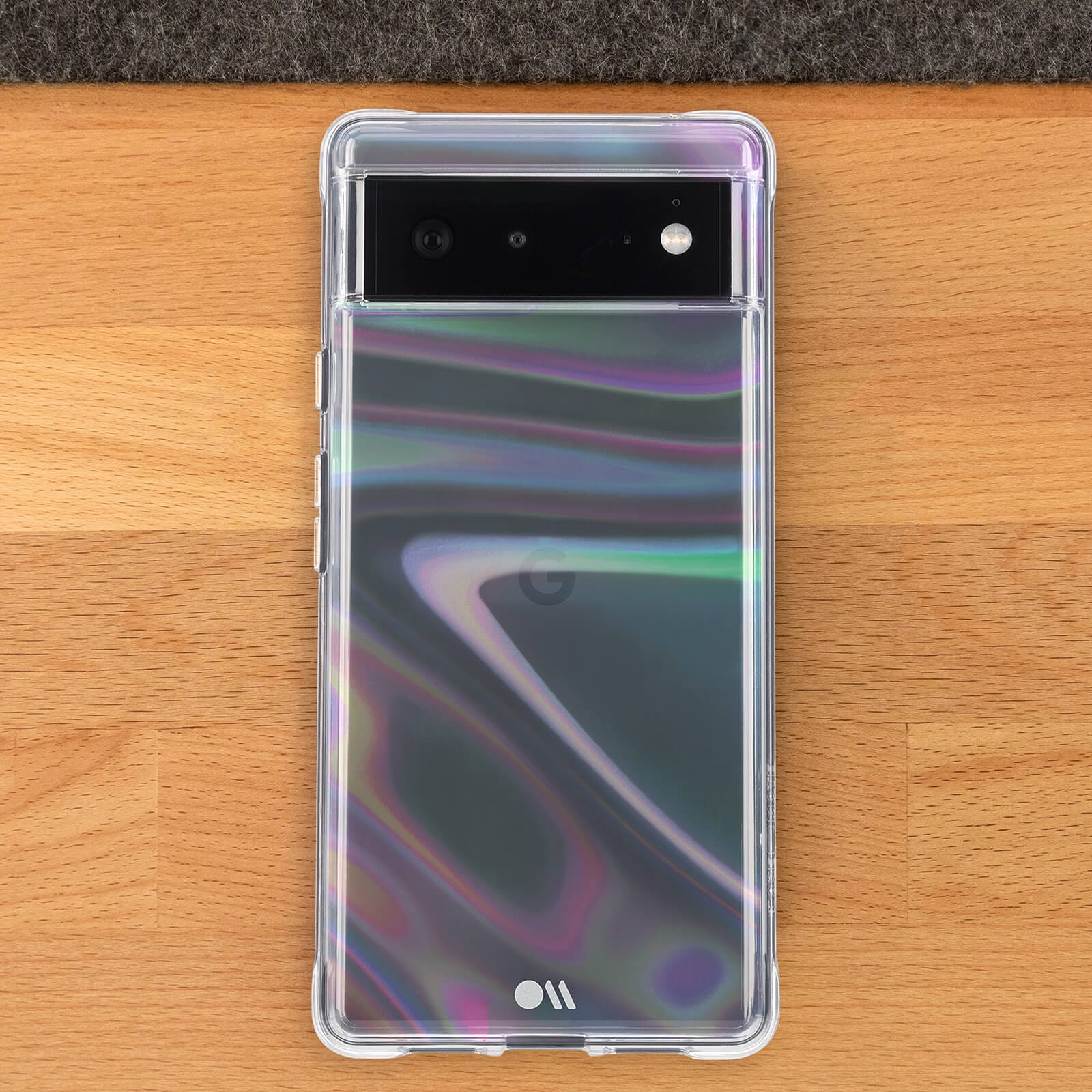 Soap Bubble for Pixel 6 on a wooden background. color::Soap Bubble