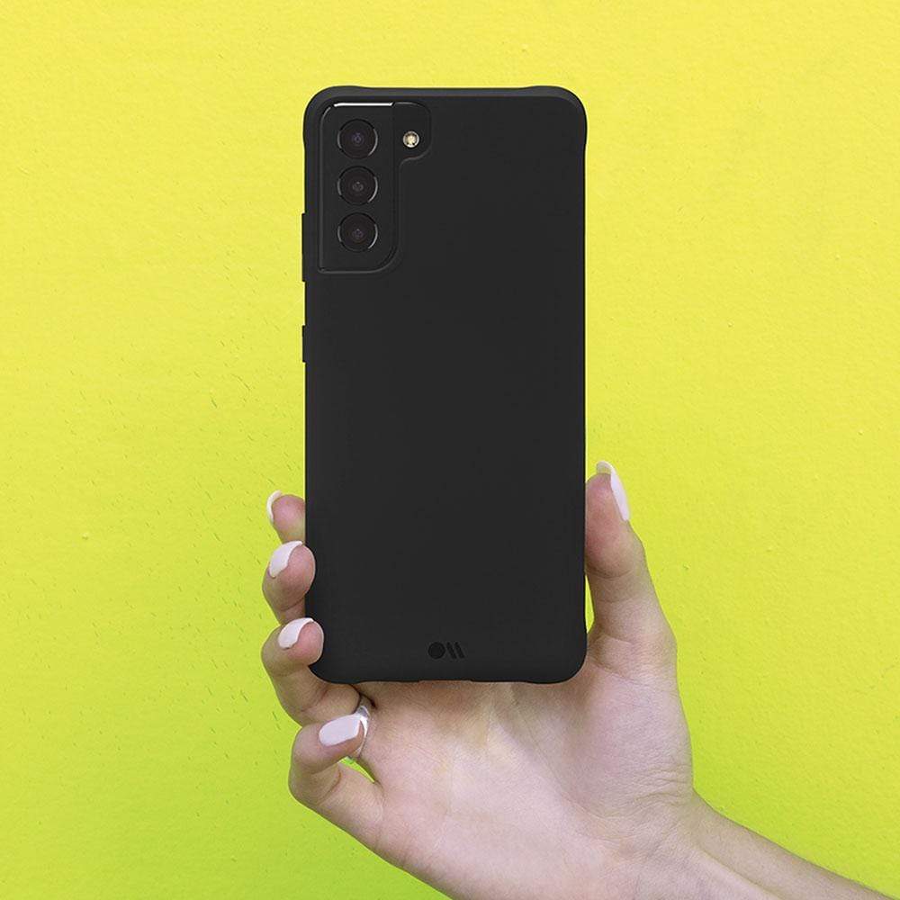Case held up against yellow background. color::Black