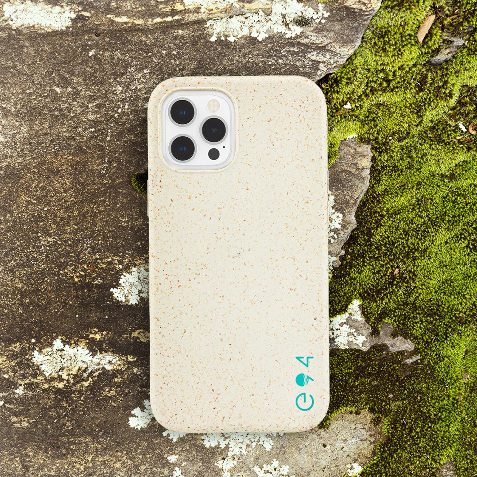 ECO 94 Biodegradable iPhone 12/12 Pro case sitting on mossy rock. color::Natural