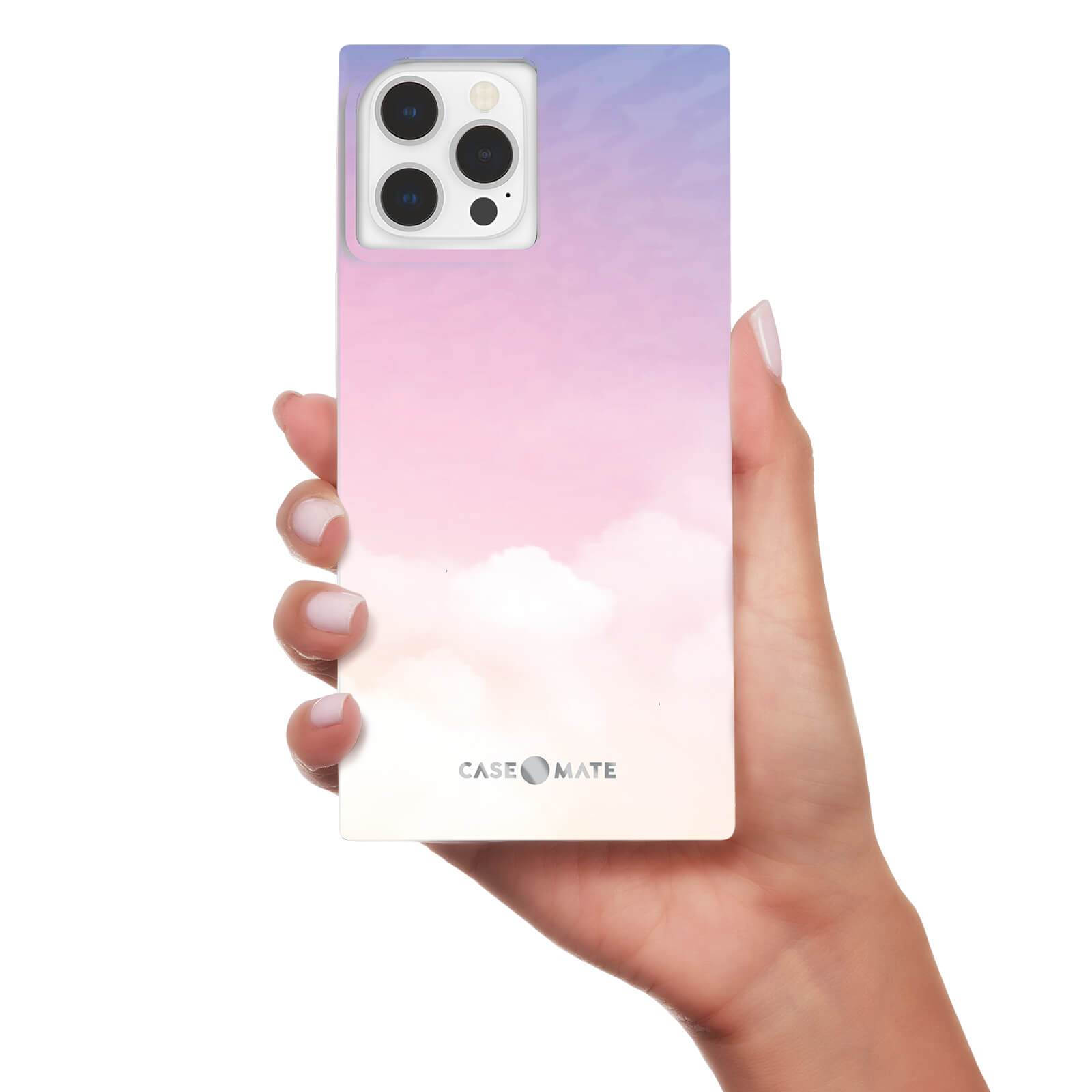 Hand holding cloud print square case. color::Clouds