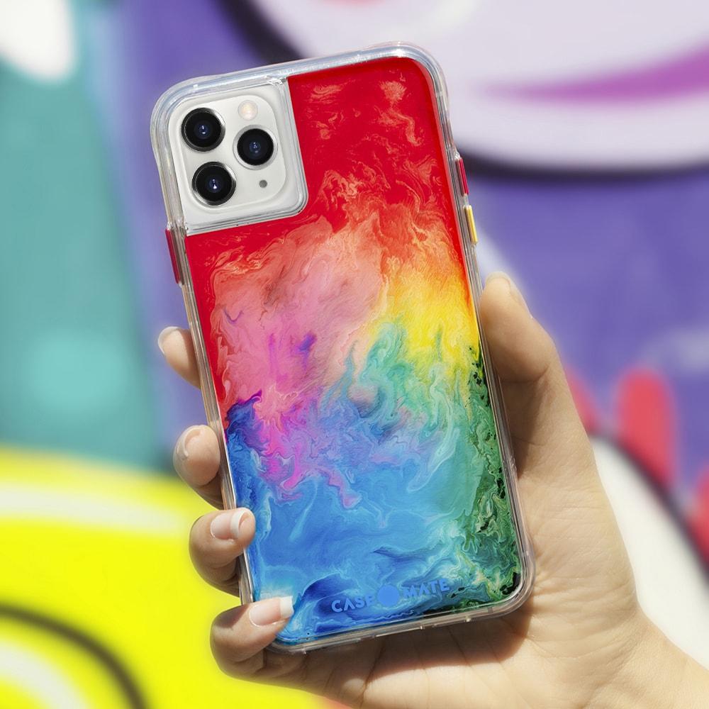 Hand holding watercolor case. color::Watercolor