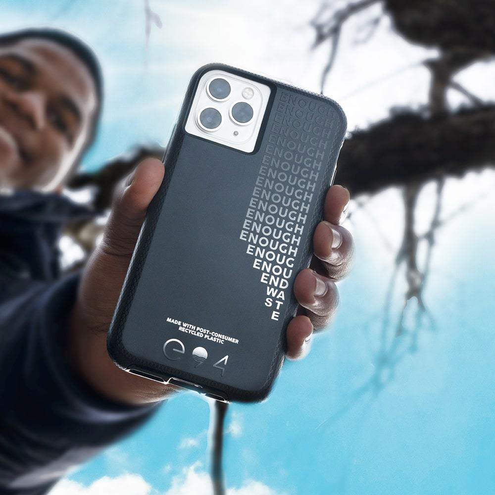 Man holding Recycled iPhone 11 Pro Max case. color::Enough