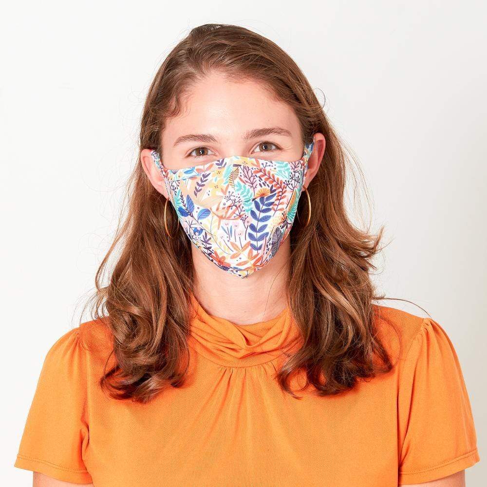 Woman wearing comfortable, effective cloth face mask. color::Ferns