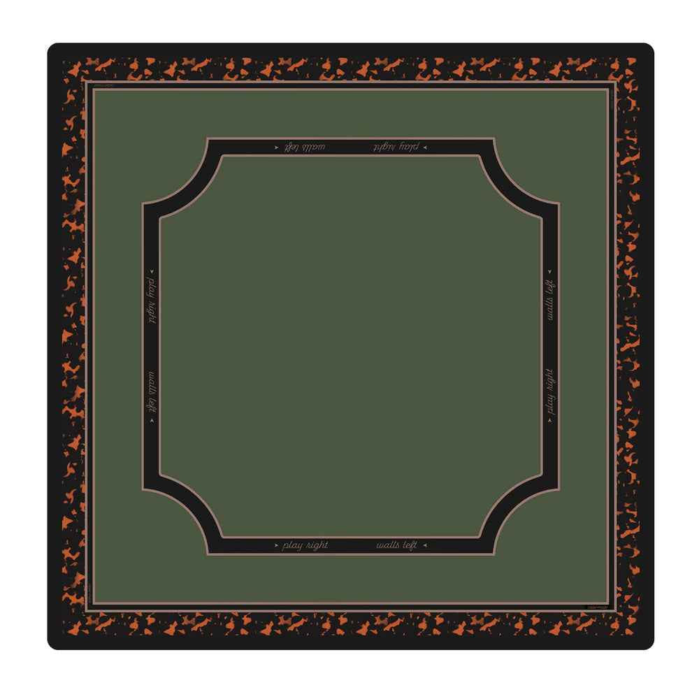 A square decorative card or print with a dark olive green center, bordered by a black frame with orange speckled motifs and small gold script text, shown on a plain white background.
#color_classic tortoiseshell