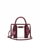 Clear stadium bag with burgundy straps and bandana scarf on strap 
#color_mulberry twilly