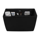 Black storage ottoman with various items on a white background
#color_midnight black