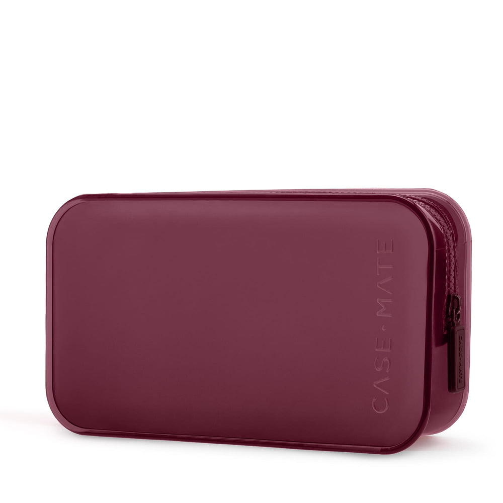 A dark burgundy zippered pouch with rounded corners and the brand name 'CASE-MATE' embossed vertically on the right side, shown on a clean white background.
#color_mulberry