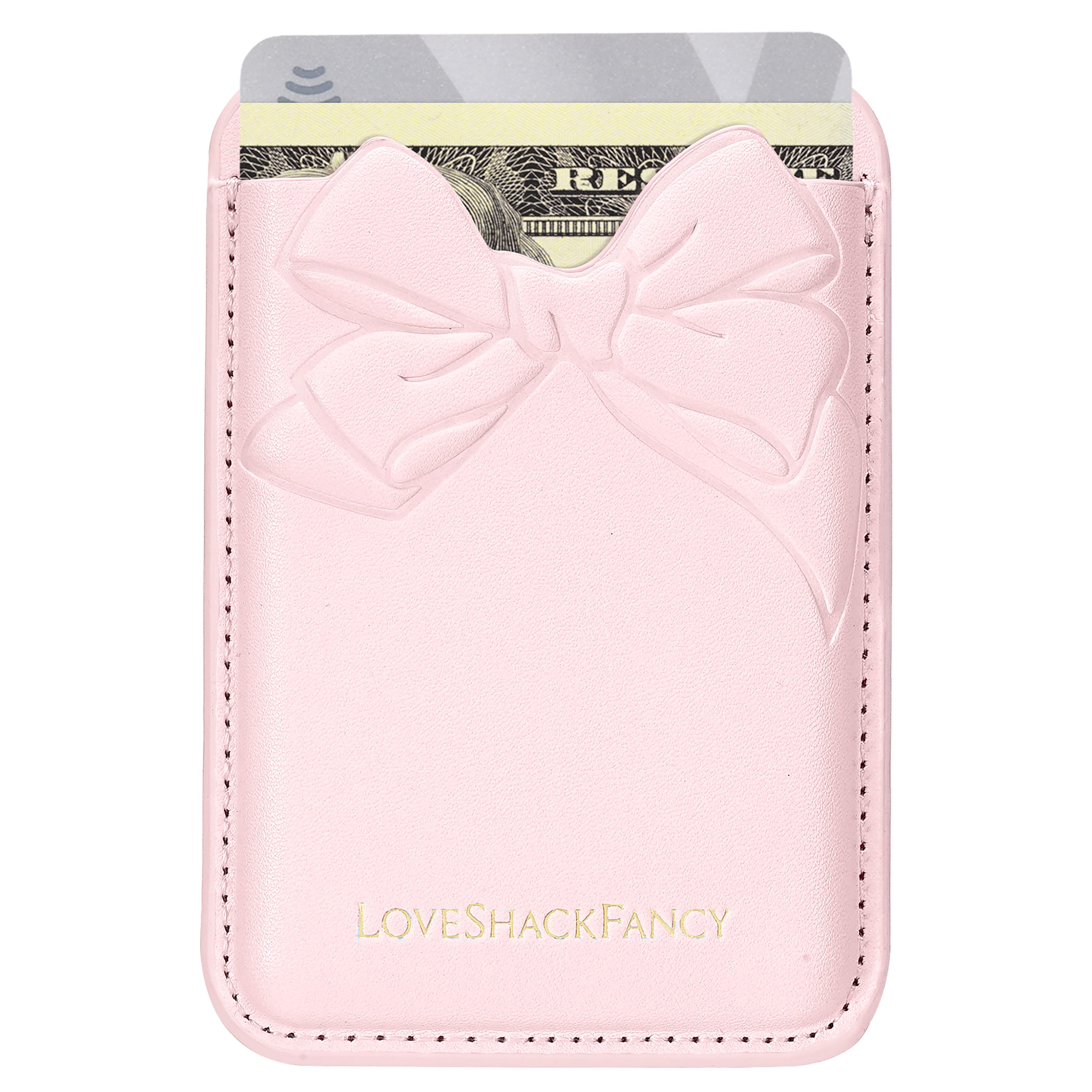 Pink cardholder with a bow design featuring 'LOVE SHACK FANCY' 
branding.
#color_pink