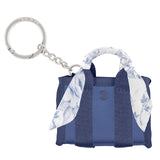 Blue handbag keychain with floral scarf on a white background
#color_something navy twilly