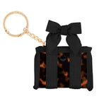 Black bow keychain with a leopard print bag charm on a white background
#color_tortoiseshell bow