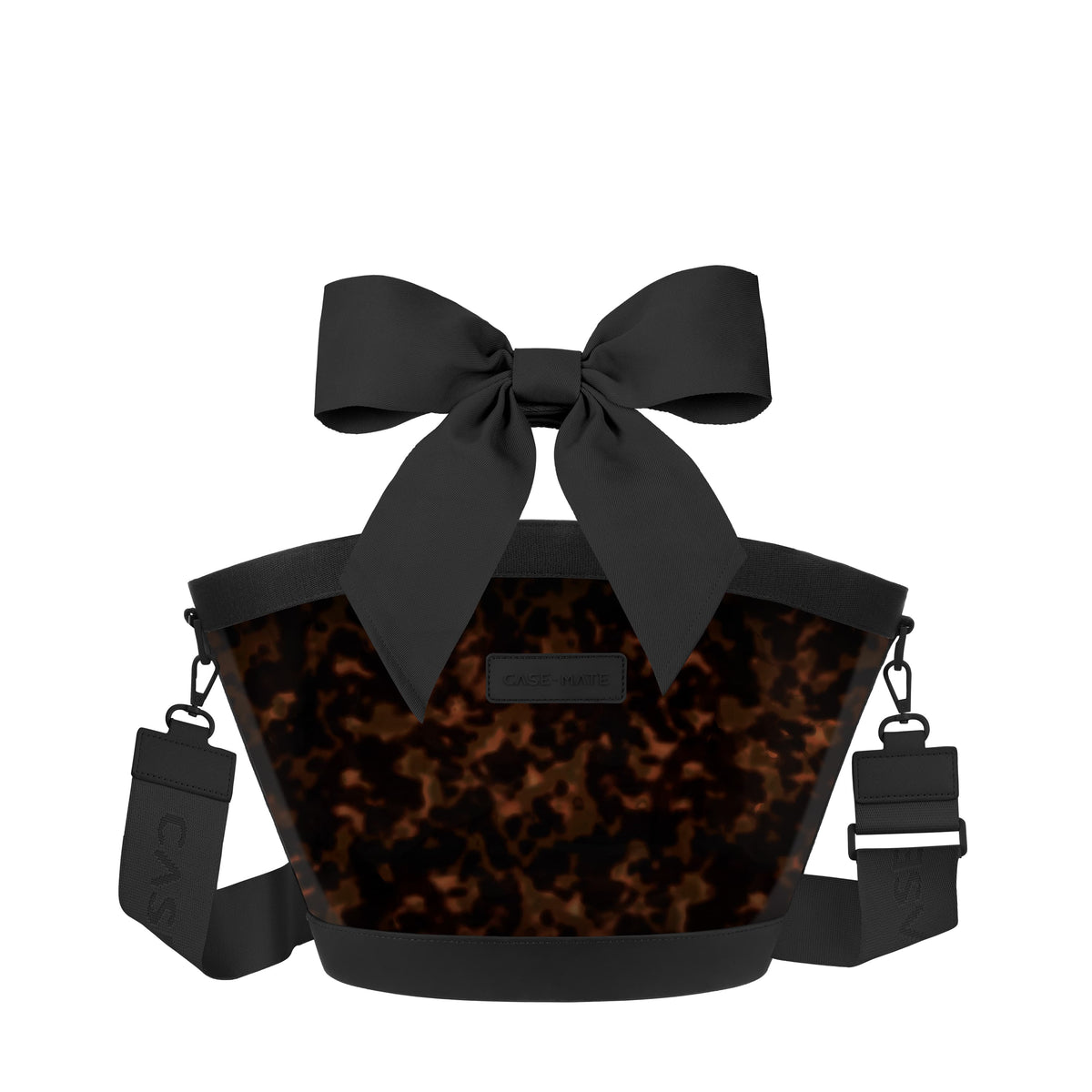 A tortoiseshell print cooler bag with a large black bow on top, featuring a brown and black tortoiseshell patterned body, black webbing straps, and a small black brand plaque on the front.

#color_tortoiseshell bow