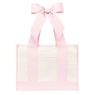A light pink and white tote bag with wide pink shoulder straps and a large matching pink bow at the top, shown on a plain white background.
#color_ballet pink bow