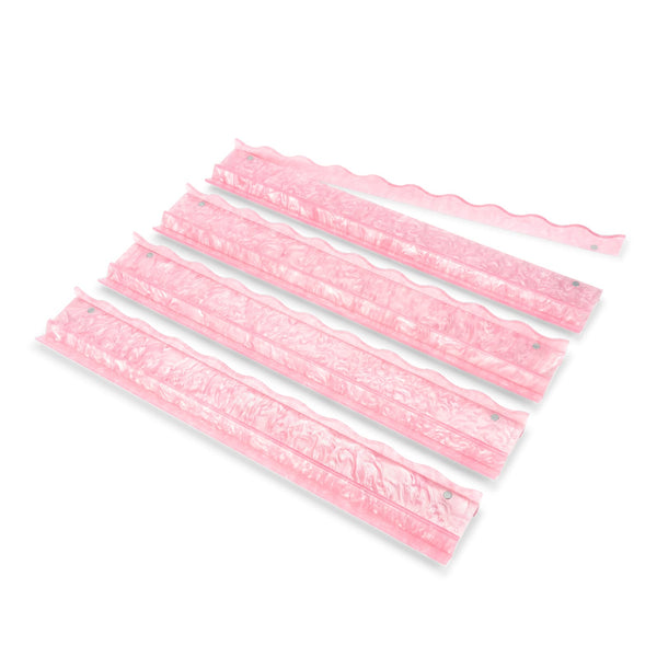 Five pink decorative trim or lace-like strips arranged diagonally on a plain white background.
#color_Ballet Pink Pearl