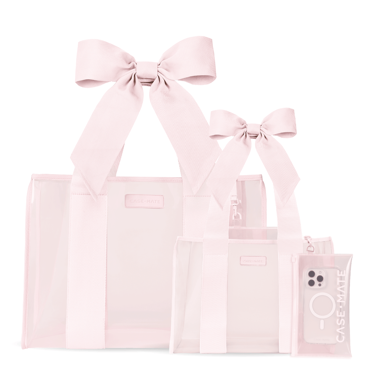 Three light pink transparent tote bags of different sizes with matching ribbon handles and a small matching zip pouch, photographed on a clean white background.