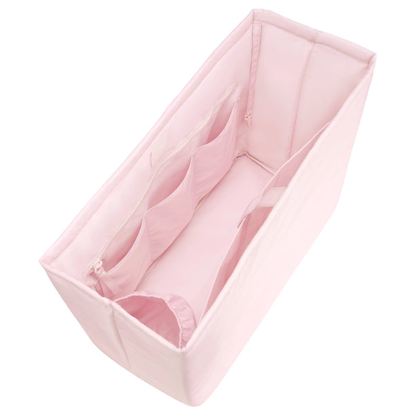 Pink bag organizer with inserts. Shot from above on a white background #color_ballet pink