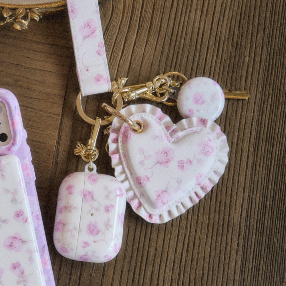 Floral heart-shaped keychain and phone case on a wooden surface
#color_blooming heirloom