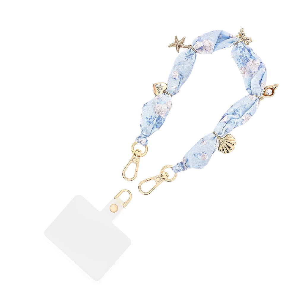 Blue floral-patterned strap with gold hardware on a white background
#color_everblooming rosettes