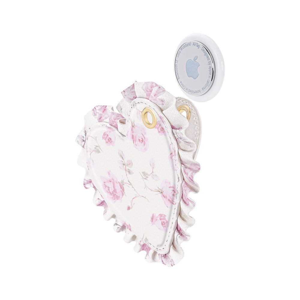 Floral-patterned baby wrap with a digital thermometer on a white background
#color_ribbon rosa flora