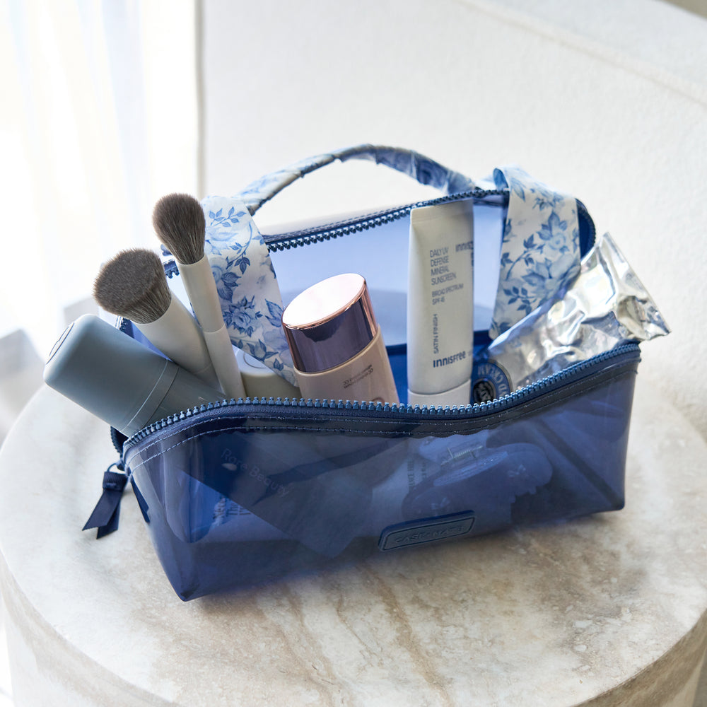A cosmetic bag full of makeup
#color_something navy twilly