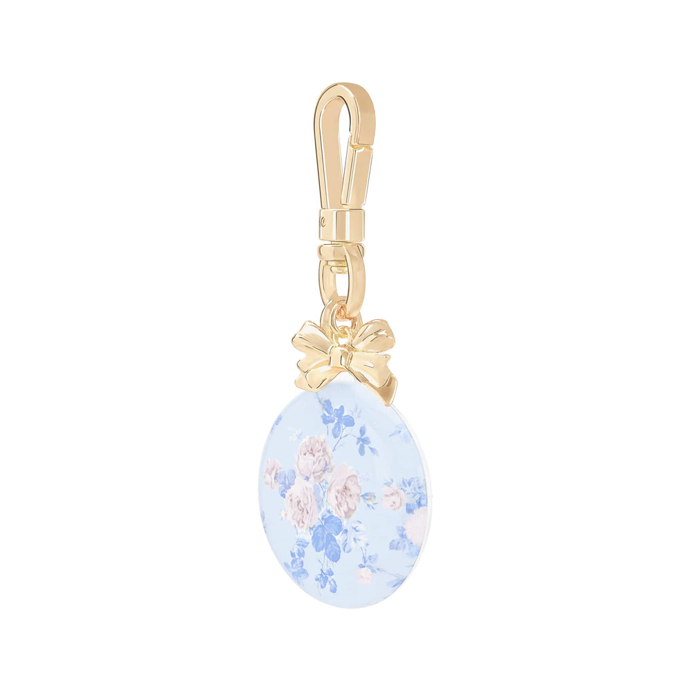 Decorative keychain with floral design and gold bow on a white background
#color_everblooming rosettes