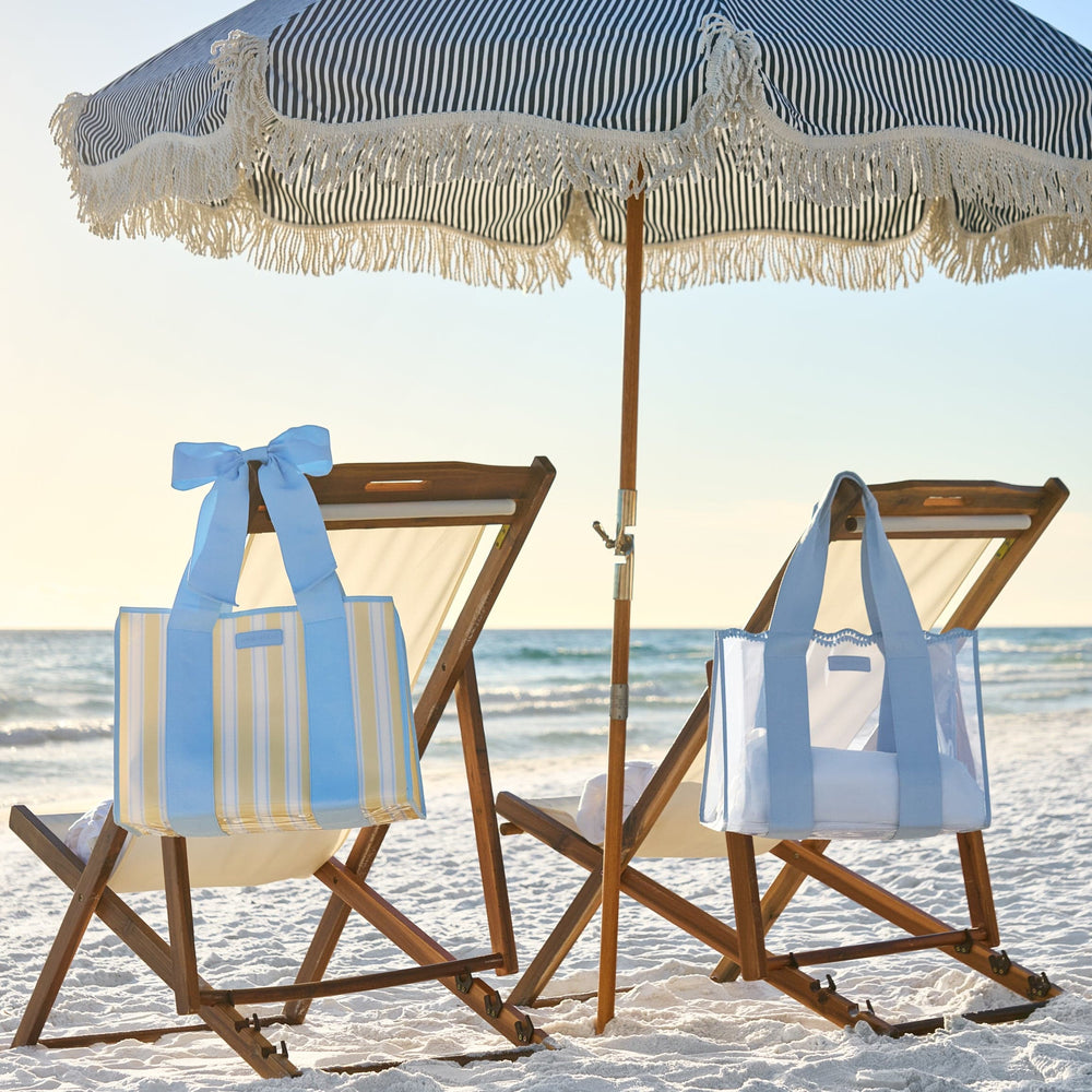 Cabana Stripe and Crotchet Wave Jelly tote bags on the beach