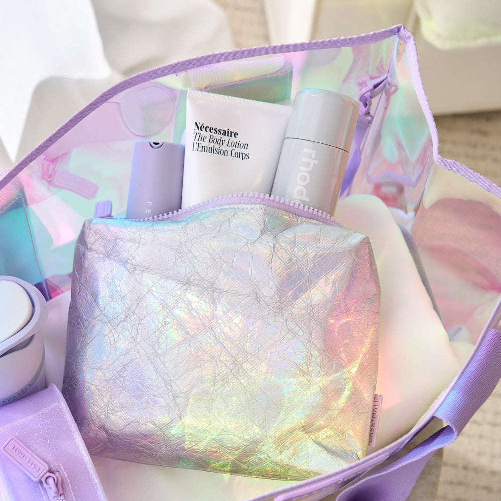 Iridescent makeup bag with skincare products on a neutral background
#color_iridescent